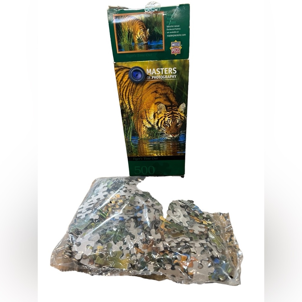 500 piece photography masters puzzle. Sealed in bag unopened.